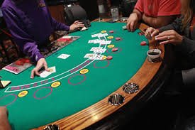 Mobile phone showing bonus casino account setup and Formula 1 market selection